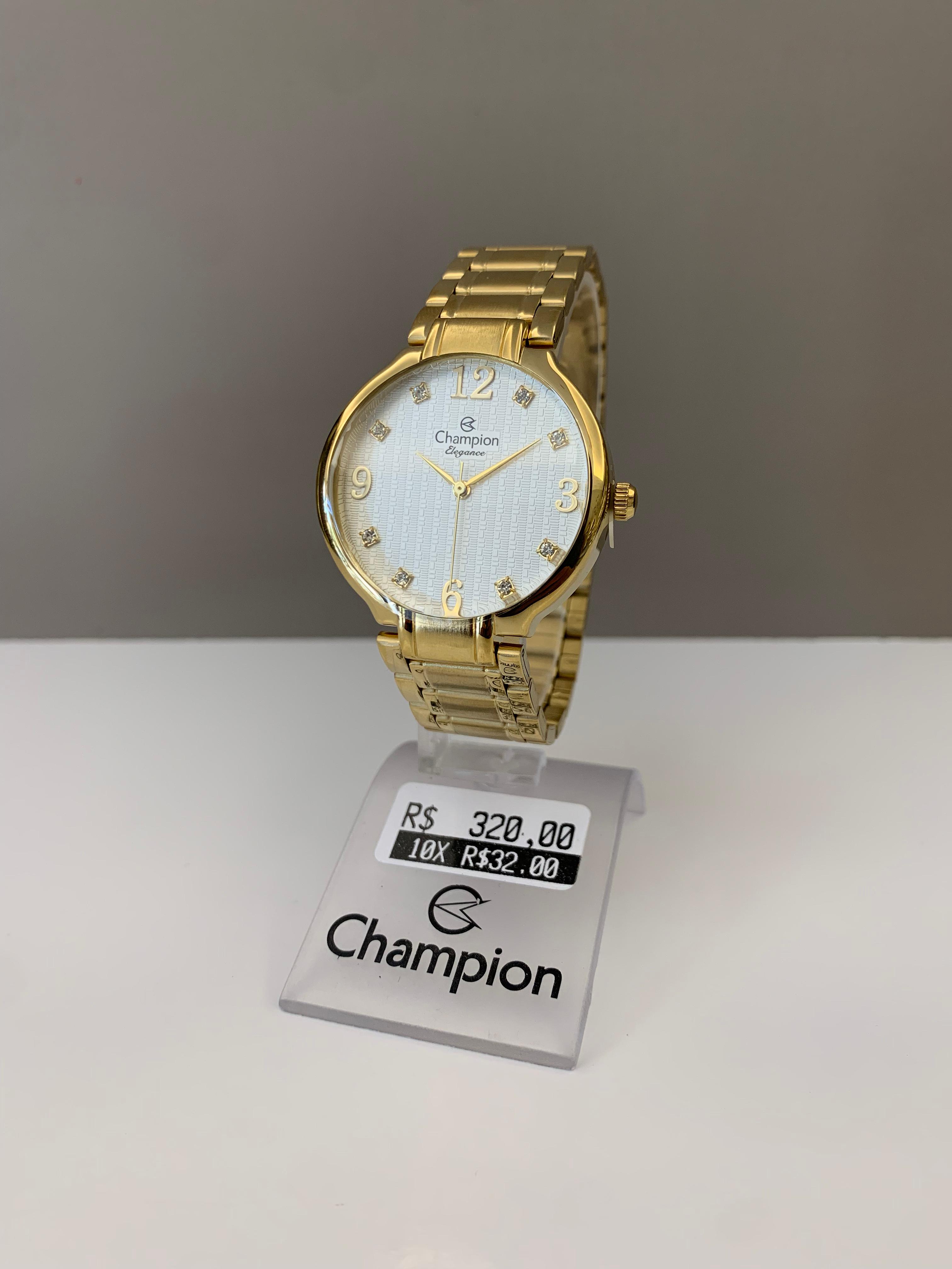 Kit Relógio Champion Elegance Feminino Dourado Visor Prata Texturizado com Cristais mais Bolsa Clutch á Prova D'água CN26831G