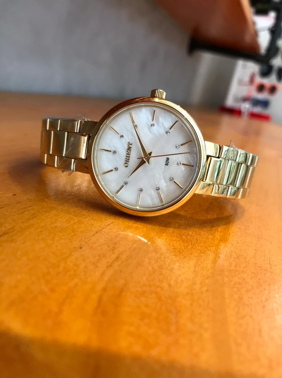 relogio tissot feminino dourado