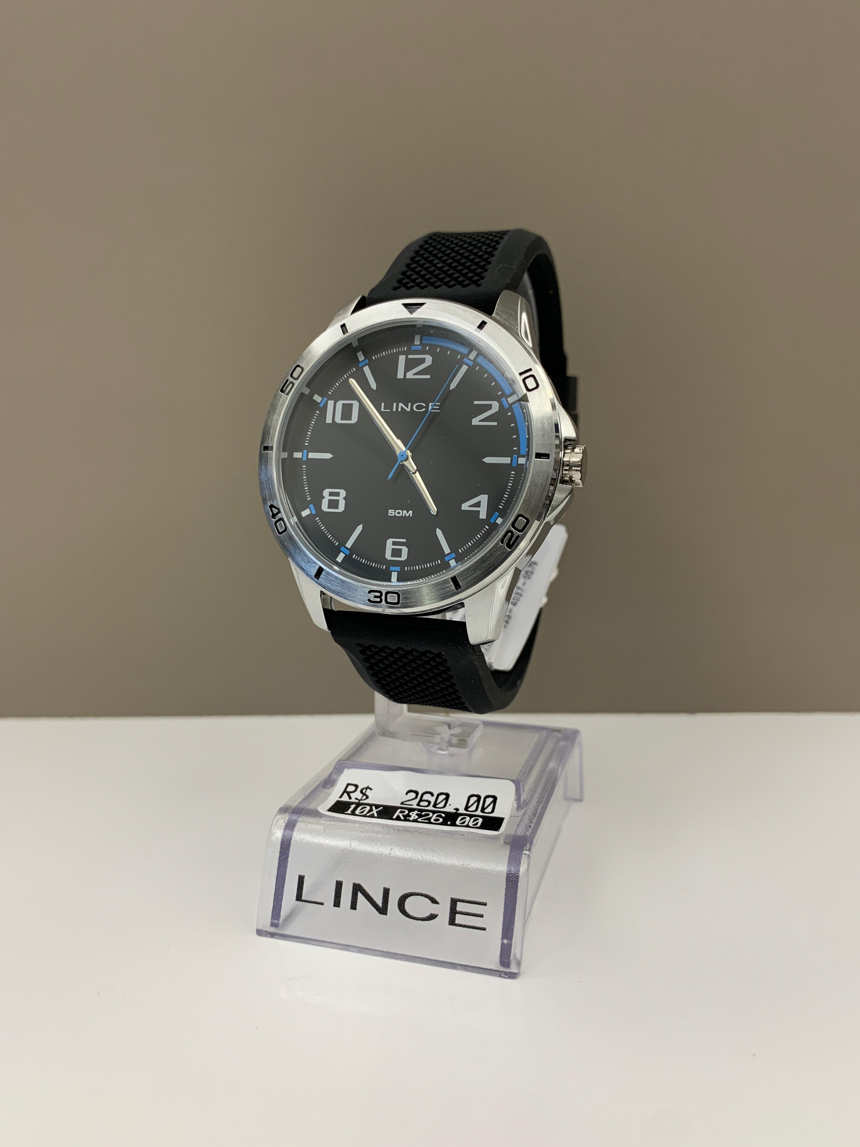 Relógio Lince Masculino Prateado com Mostrador Preto e Detalhe Azul Pulseira em Silicone Á Prova D'água MRPM006L46