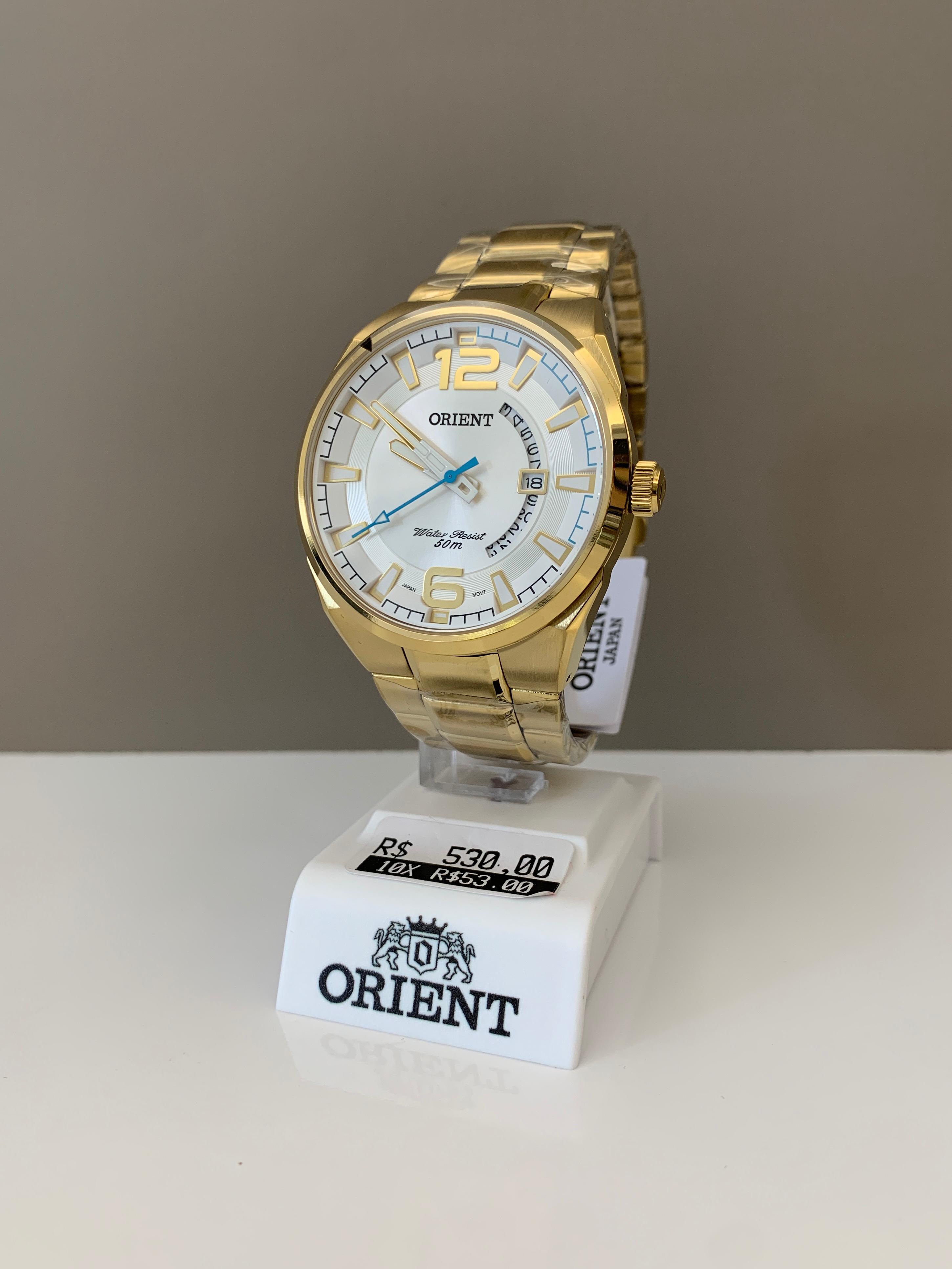 Relógio Orient Masculino Dourado Visor Branco com Calendário Maquinário Japonês Aço Inoxidável Á Prova d'água MGSS1159 S2KX