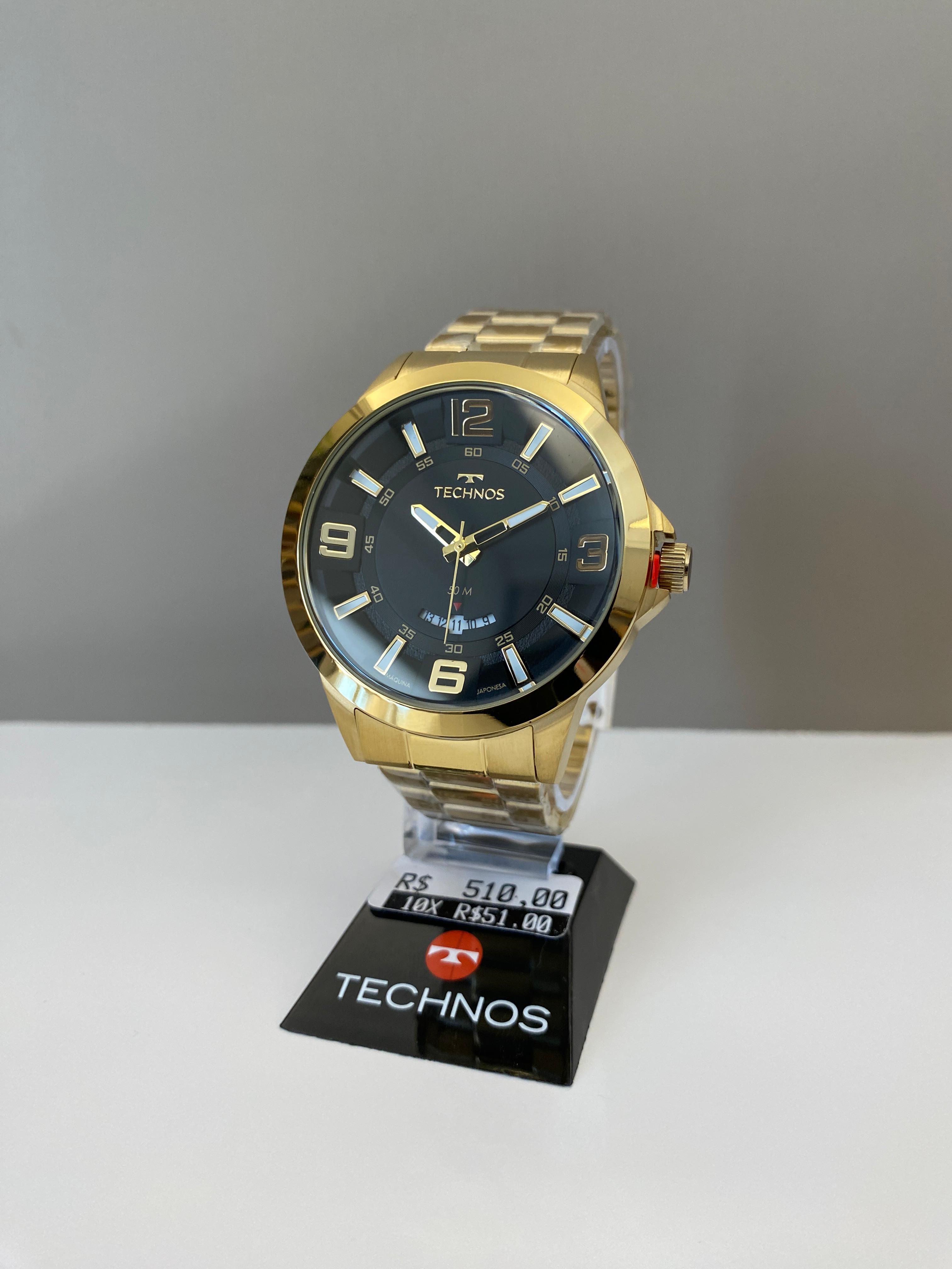 Relógio Technos Performance Masculino Dourado Visor Preto com Calendário Aço Inoxidável Maquinário Japonês A Prova d'água 2117LBO/4E