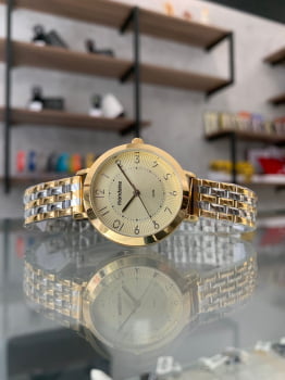 Relógio Mondaine Feminino prateado e Dourado com Pulseira Bicolor a prova d´água 53864LPMVBE1