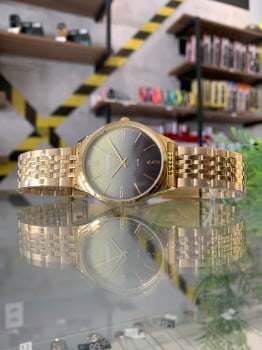 Relógio Mondaine Feminino Dourado com mostrador gliter degradê A prova D'água 32340LPMVDE1