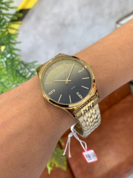 Relógio Mondaine Feminino Dourado com mostrador gliter degradê A prova D'água 32340LPMVDE1