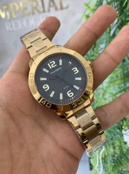 Relógio Mondaine Masculino Dourado visor preto a prova d´água 99351GPMVDE2