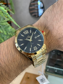 Relógio Technos Masculino Mostrador Preto com Calendário Dourado á Prova D'água 2115MZV/1P