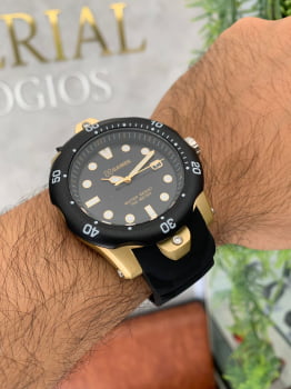 Relógio X-Games Masculino em resina e silicone dourado com preto Calendário A prova d´água XMPP1051